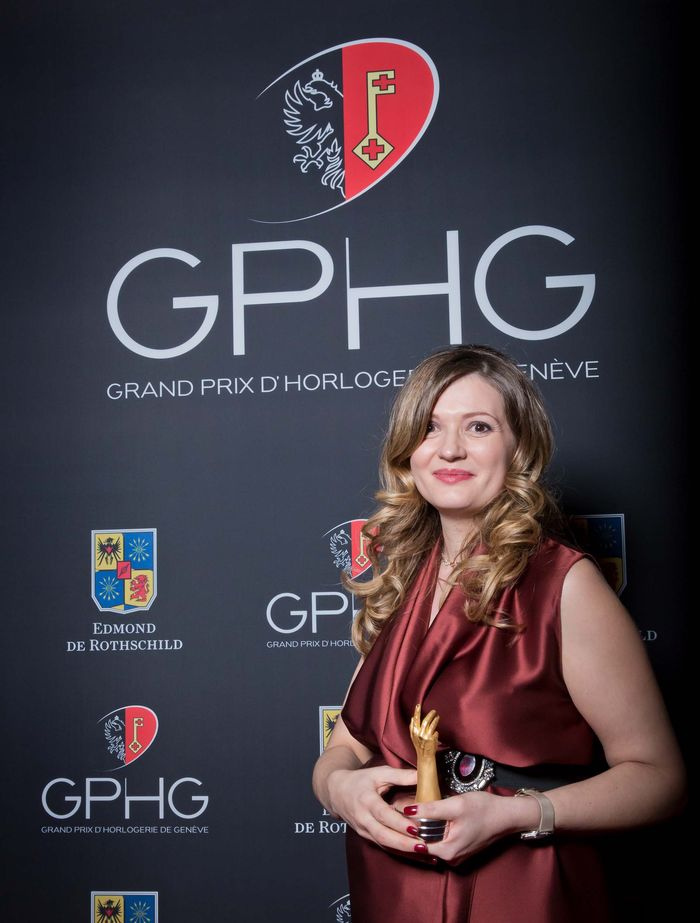 Brigittie Morina Delaneau's CEO posing with the GPHG prize Brigittie Morina Delaneau's CEO posing with the GPHG prize