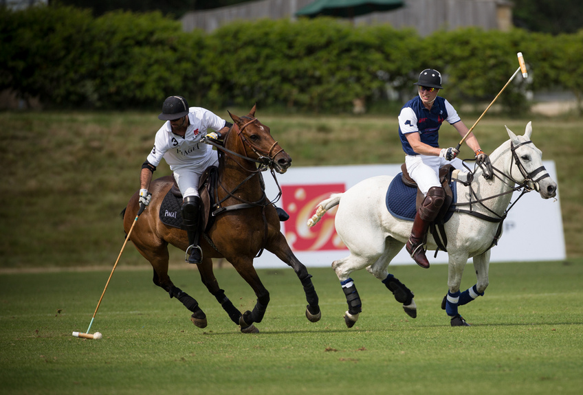 Piaget team’s Facundo Pieres and Royal Salute team’s HRH The Duke of Cambridge go head to head in the Goldin Group Charity Polo Cup, 22nd June 2014